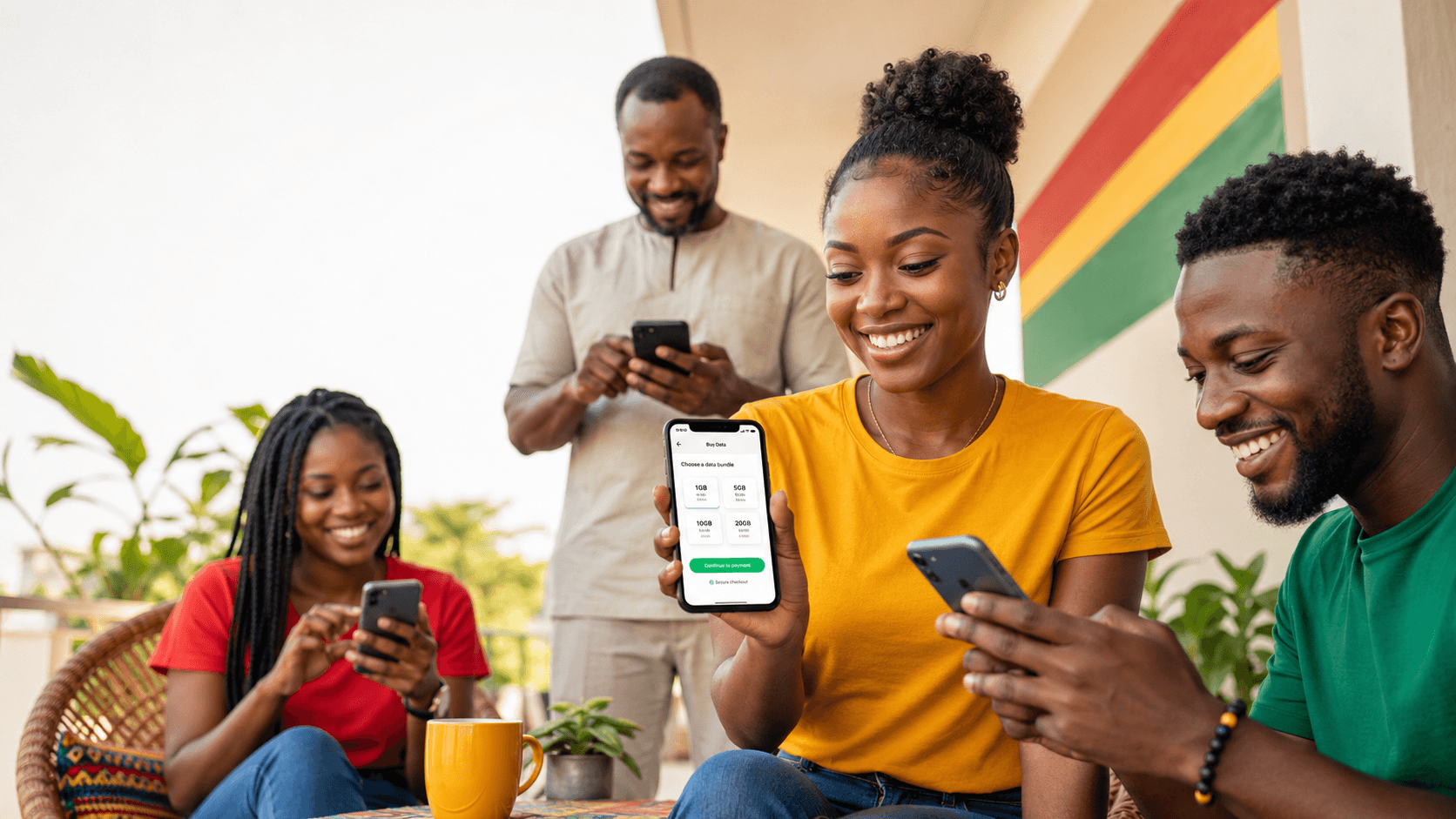 Ghanaian agents and customers using GhanaDataMall on mobile phones together